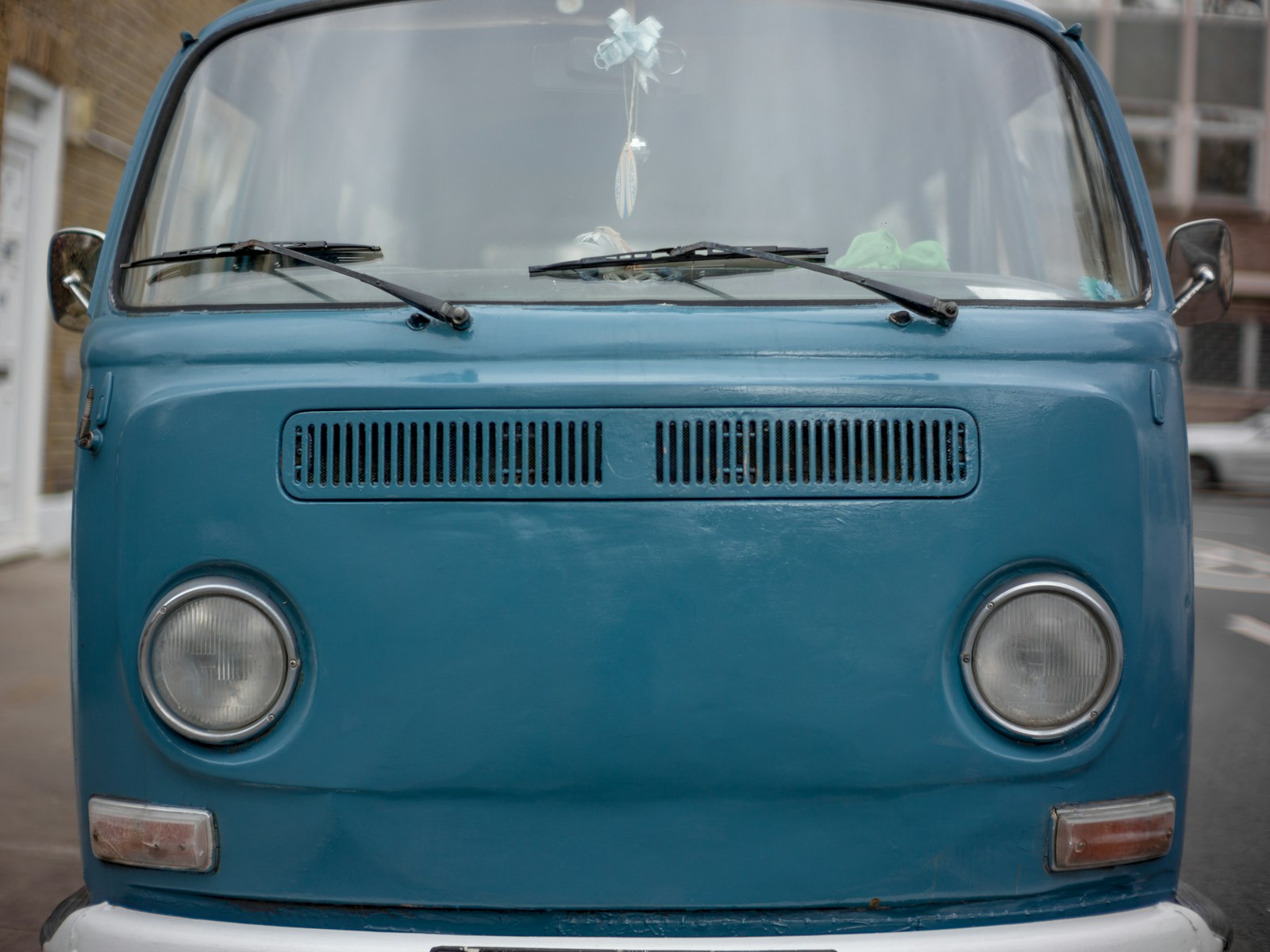 Photo by the blowup blue and white volkswagen car